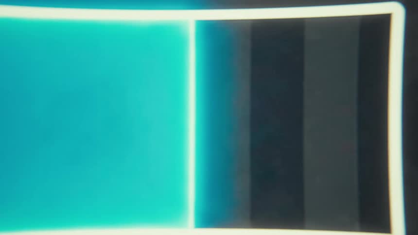 Computer screen displaying a bright blue line moving from left to right across the screen