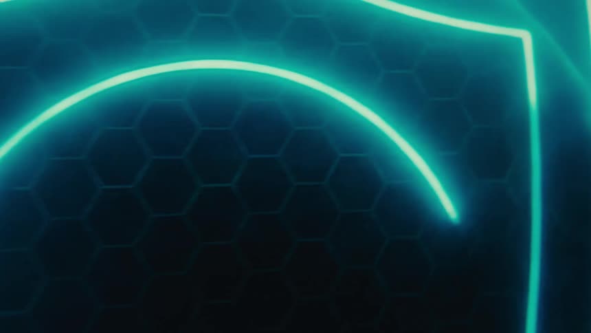 A graphic of a glowing shield is on the monitor