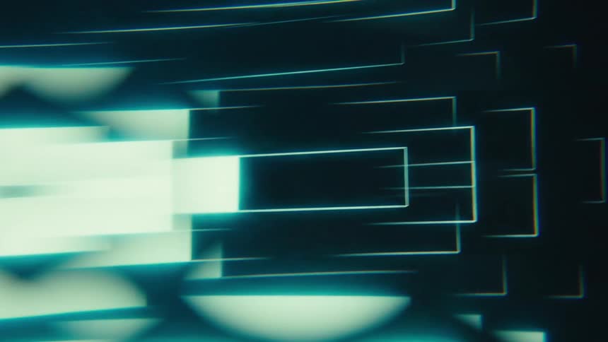 Blurred glowing streaks in bluish tones stretch across a dark background