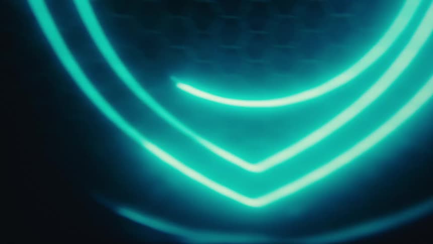 Blue light creates inner and outer circles in a symbol shining against a black background