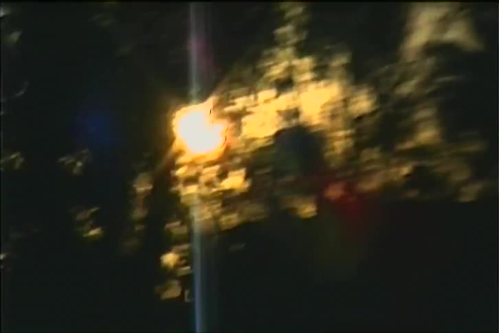 The first line shows a bright golden sunrise with strong lens flares silhouetting a landscape with trees and power lines the second line shows the sun becoming overexposed and appearing as a large vibrant blob of light obscuring the surrounding detai