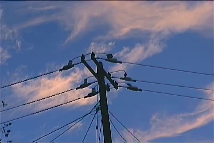 Cable connections on top of a utility pole