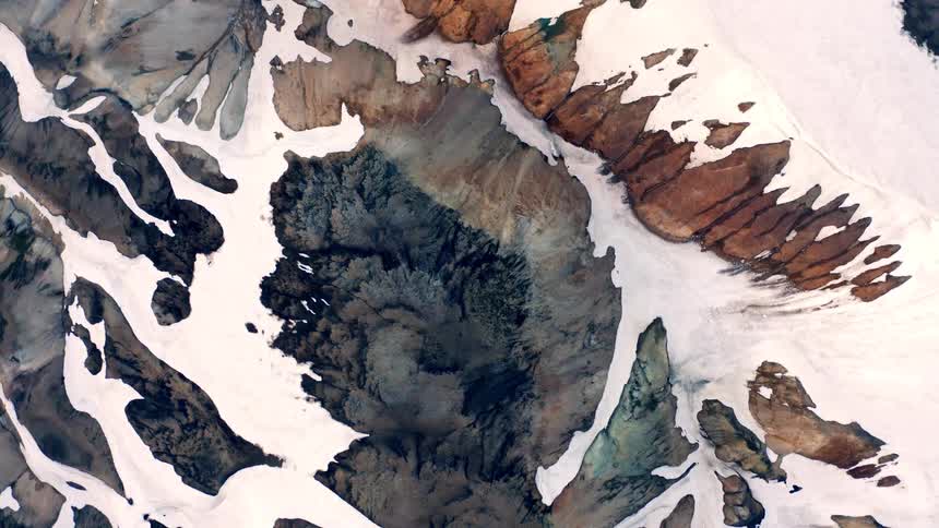 The mountain peak is covered with snow