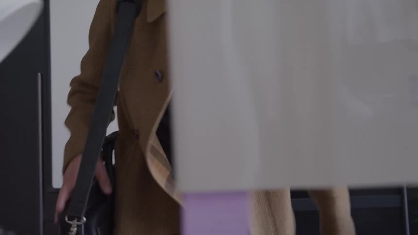 The man sits at his desk in front of the computer