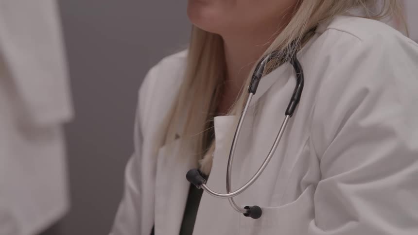 Doctor with a stethoscope hanging around the neck