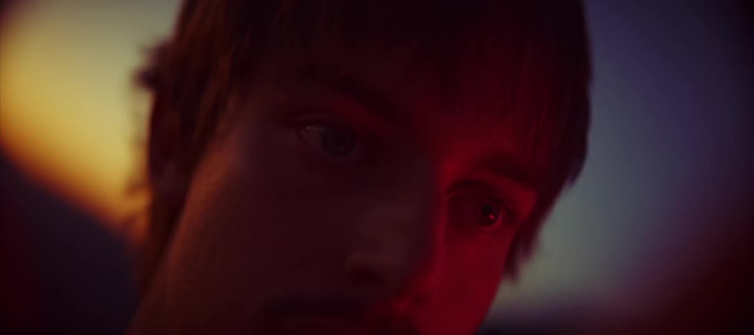 A light flashes in a mans face