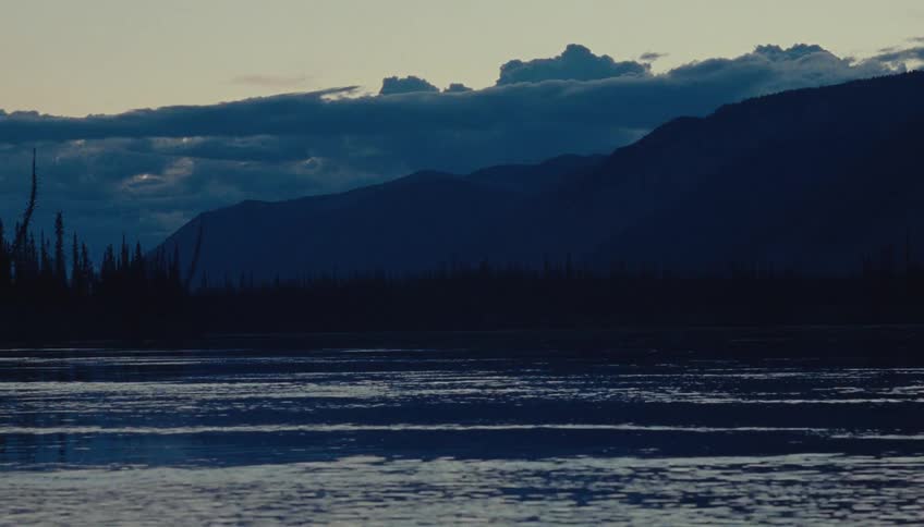 The mountains ahead are covered in clouds