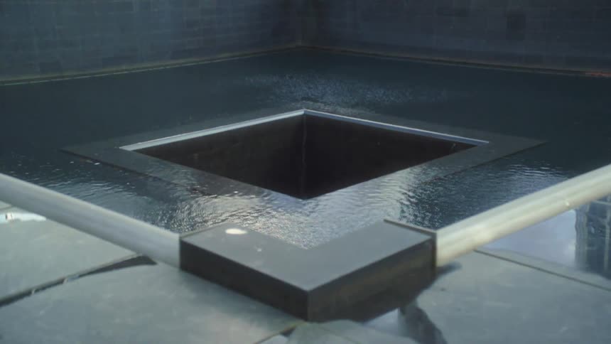 911 memorial with a square waterfall descending into the center