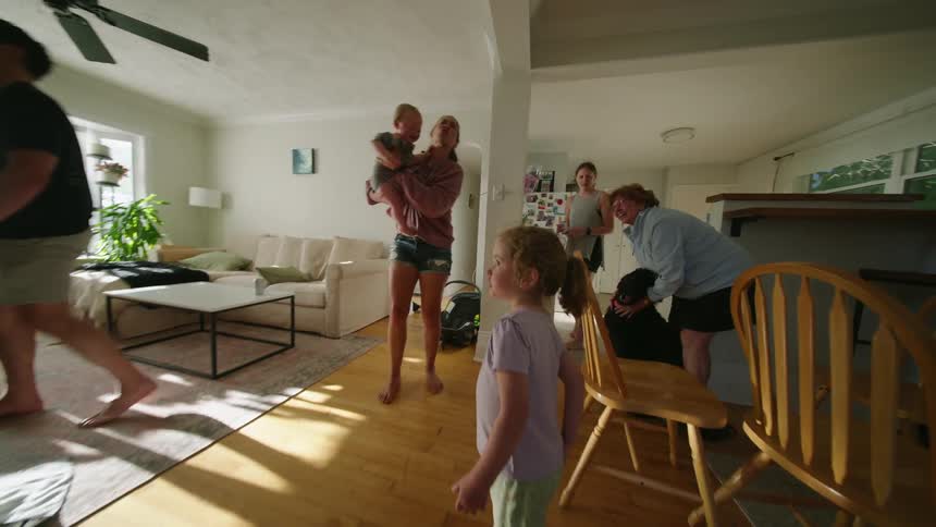 A family having fun together in a living room indoors