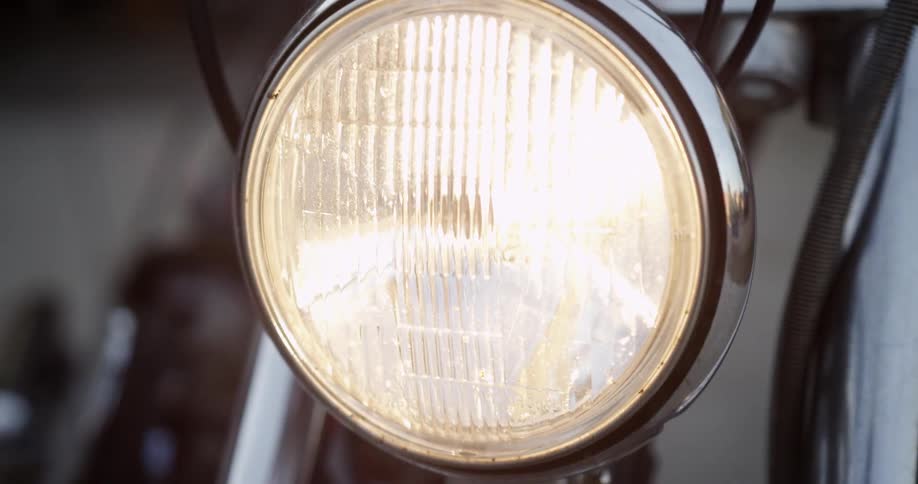 Motorcycle headlight turning on