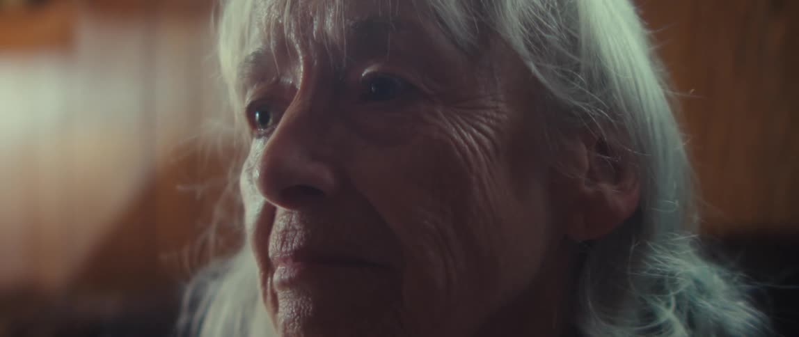 Face of an elderly person with a calm expression and serene gaze