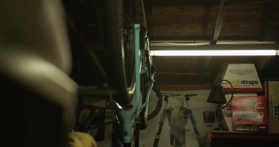 Florescent lights in a garage turning on