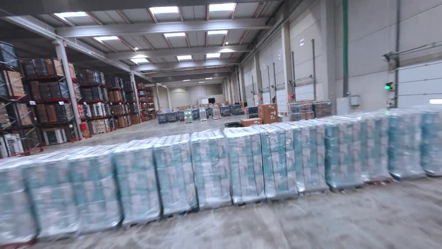 Pallets are lined up in the warehouse