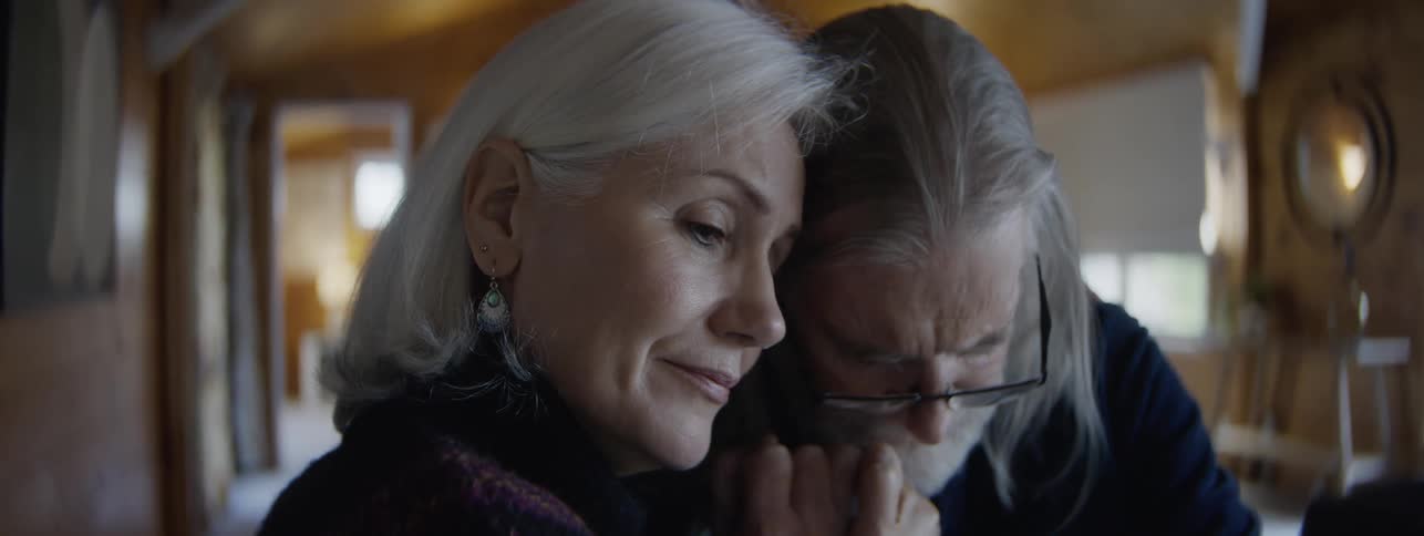 Husband and wife are sad and consoling each other