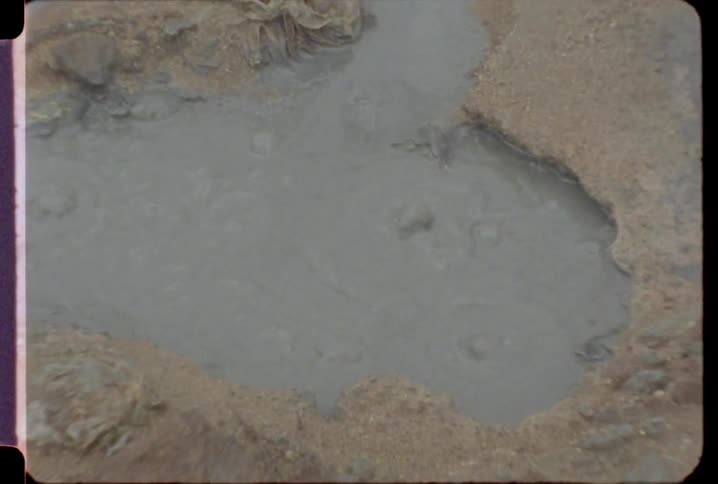 Water is bubbling in a puddle