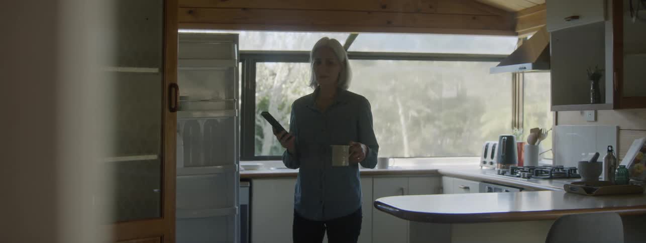 An older woman realises her husband is developing dementia after finding the remote in the fridge