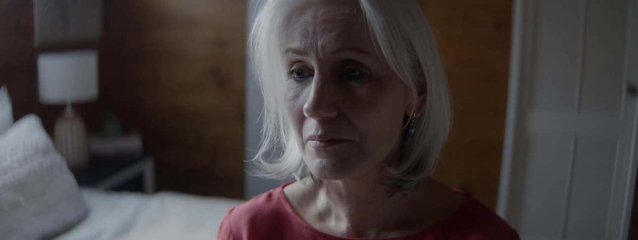 The sad women touches the side of her face