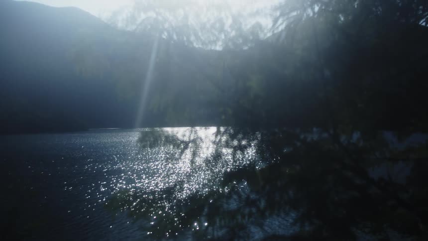 A calm cove surrounded by mountains