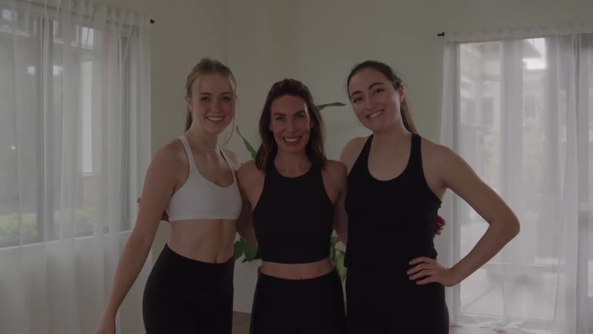 Portrait of a group of young female adult friends standing together after a fitness session