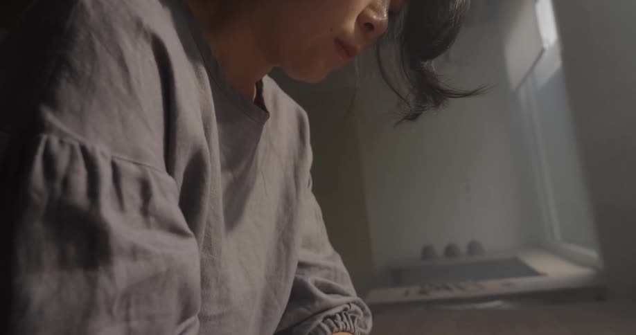 Woman kneads clay on the table in the handmade pottery process
