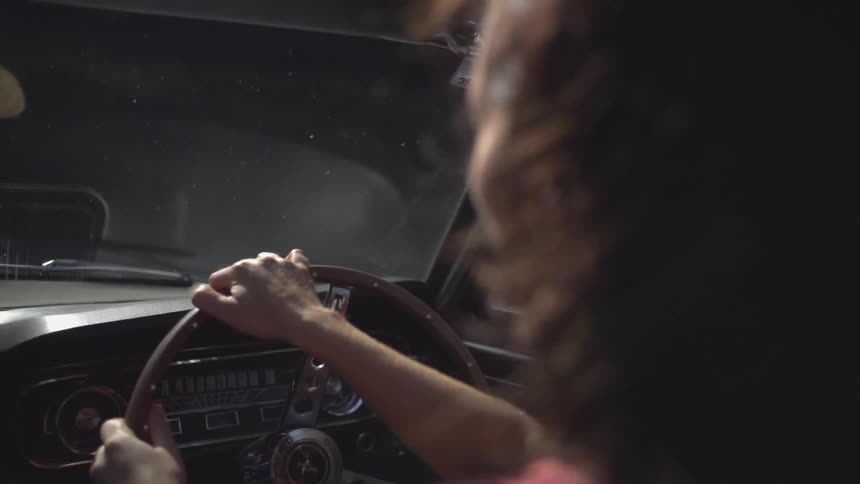 A woman driving a car