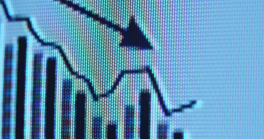 Stock price bar chart displayed on pixelated computer monitor of a broker as the market crashes and the prices of the assets go down with a negative trend and a falling arrow indicating a decline in value and a recession with shaky movement