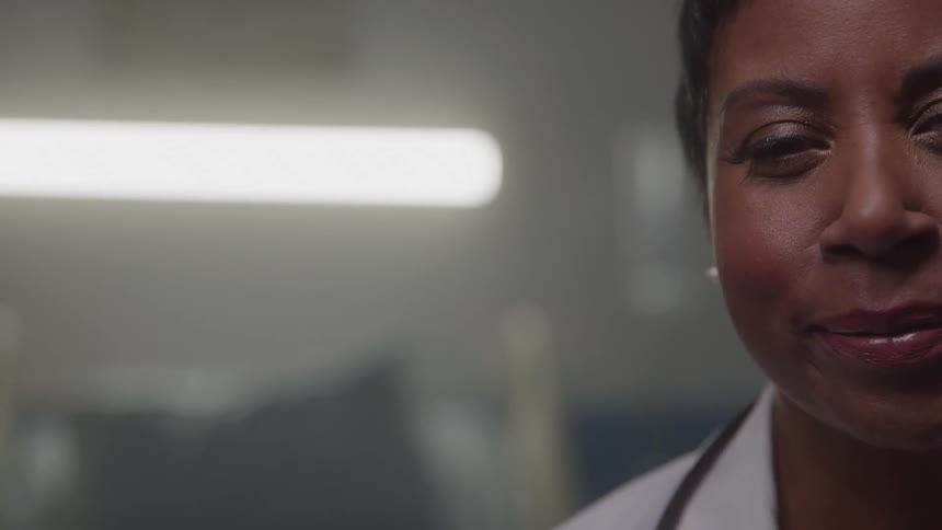 Calm smile of a healthcare professional in a clinical setting