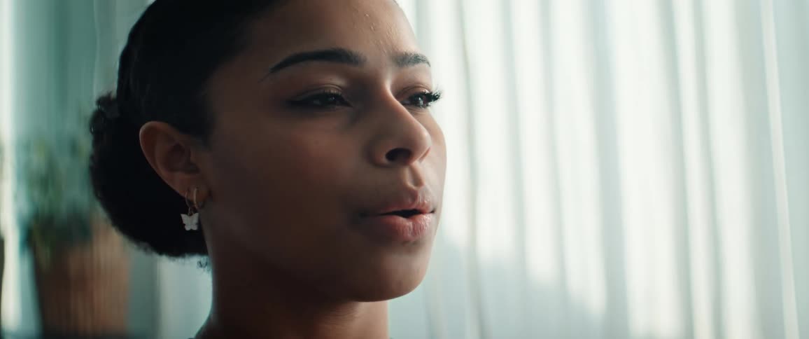 Portrait of a woman taking a deep breath