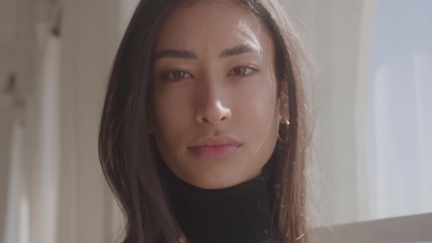 A woman looking at the camera