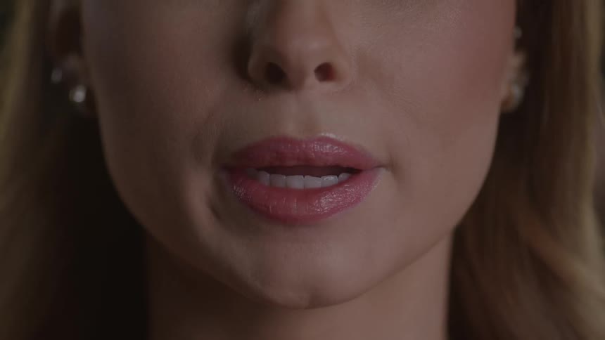 Female lips moving gently in closeup