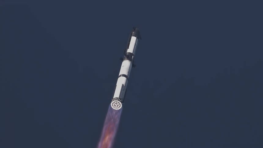 Rocket ascending through the sky leaving a trail of fire and smoke