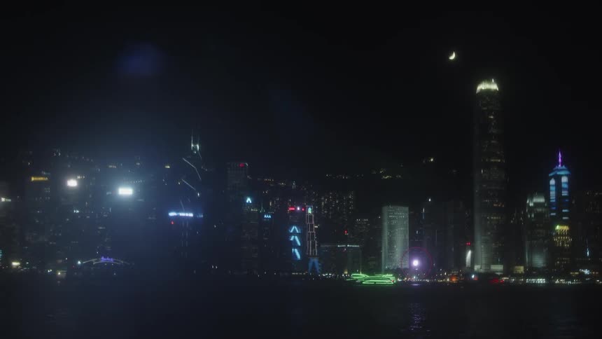The city is brightly lit at night