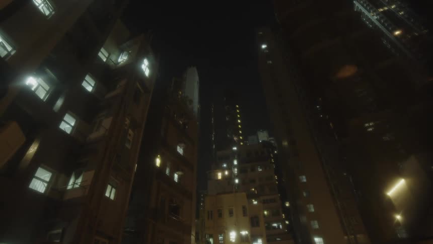 Lit highrise buildings in a metropolitan city at night