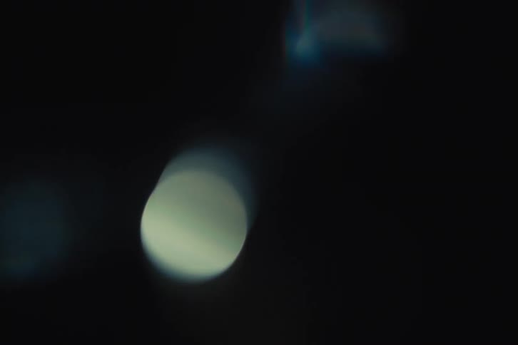 The lights flicker and move in the dark