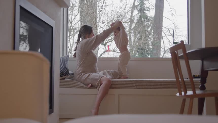 Mother playing with her daughter