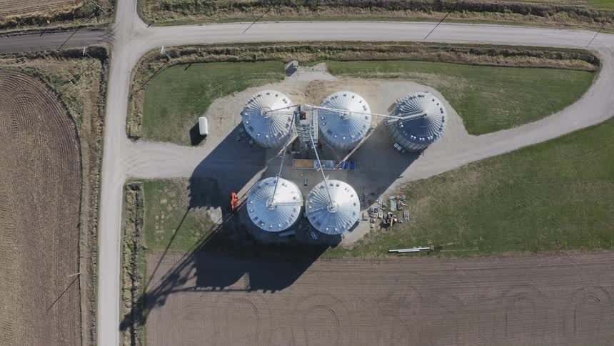 A group of silos are connected on the farm