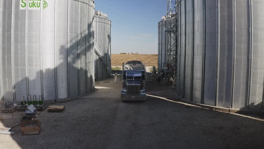 The truck leaves the silo with the crops collected