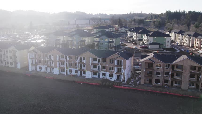 The rows of apartments are partially built