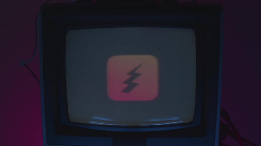 A vintage television screen cycles through various graphic symbols including a power icon an exclamation mark a barcode and a gradient circle