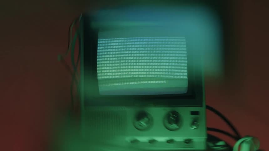 The old television has different knobs on the front