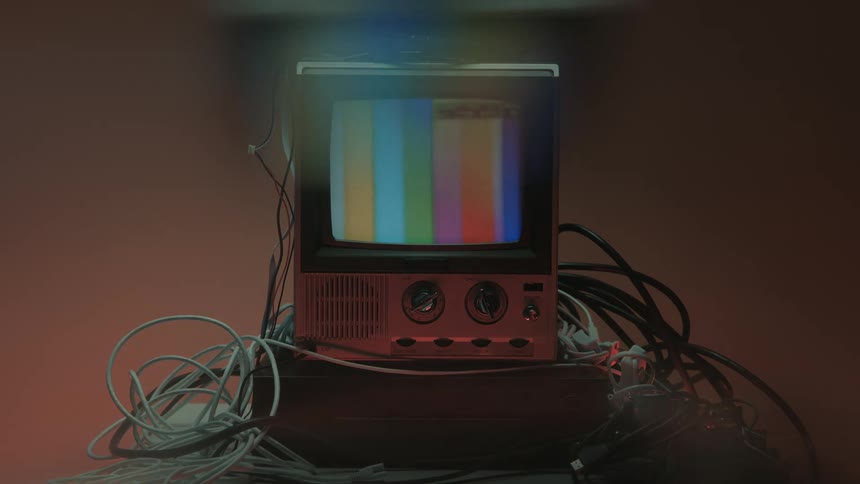 The person presses the button on the television