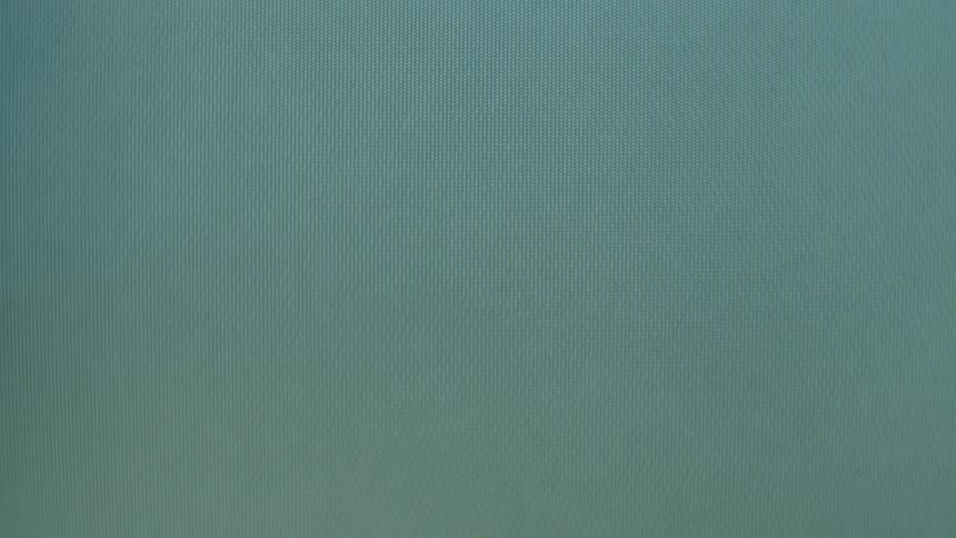 A glowing white horizontal line scrolls vertically across a dark teal pixelated television screen