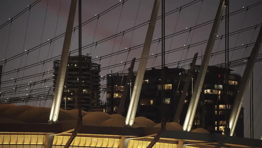 Long poles stick out of the top of the building