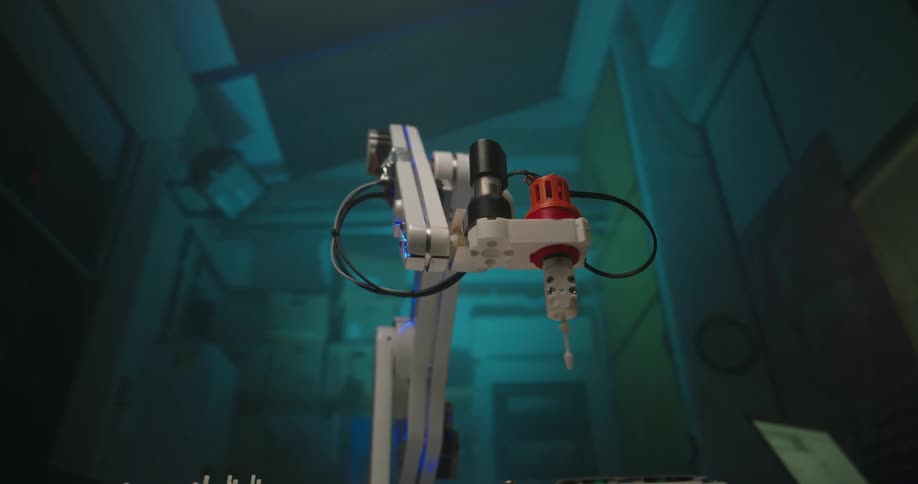 Mechanical arm with cables and a tool suspended in an industrial environment