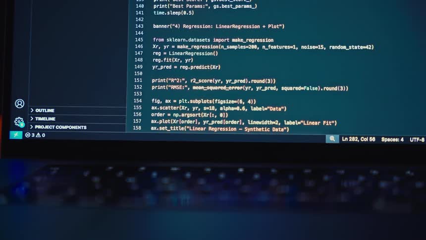 A highangle shot captures a laptop screen displaying a lengthy segment of code in a dark programming environment the text is colorcoded with bright yellow and cyan highlighting featuring variables and functions related to machine learning such as on