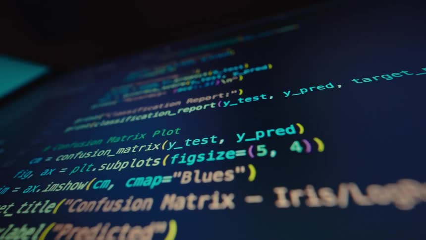 Close up of a computer screen displaying a coding software interface