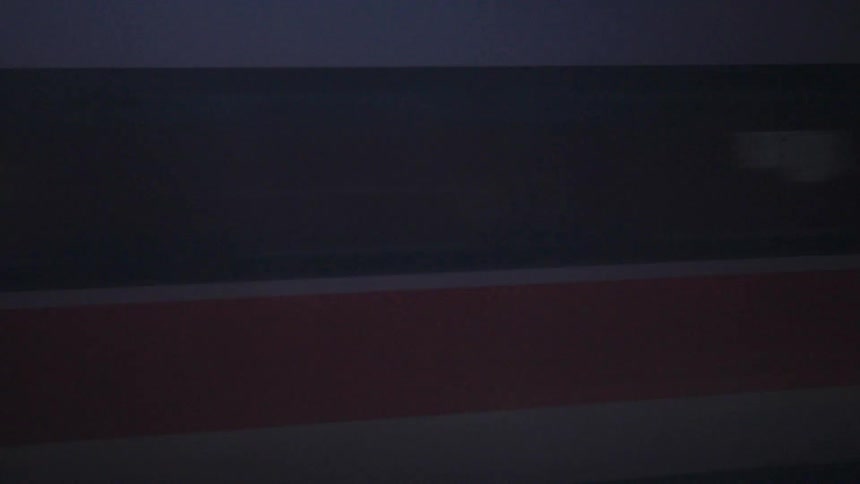 The train passes by on the tracks