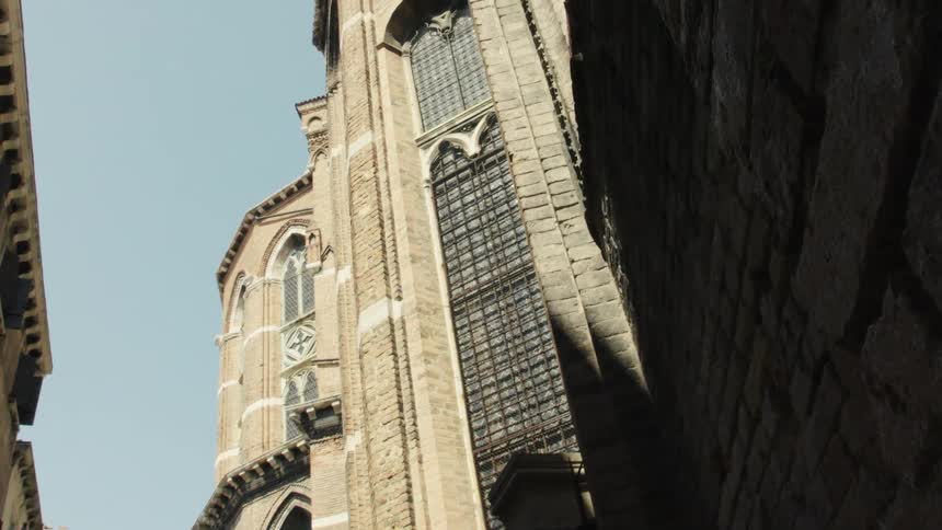 The tall church has arched windows