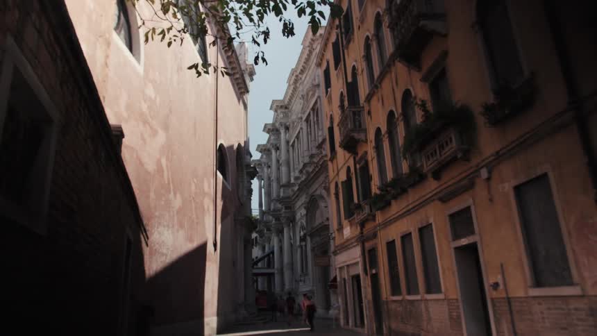 The people travel down the alley