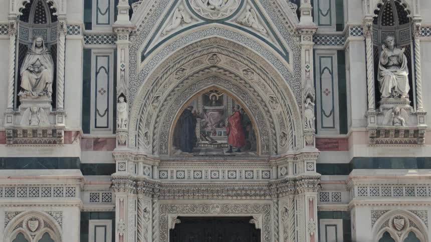 The church has statues above the doorway